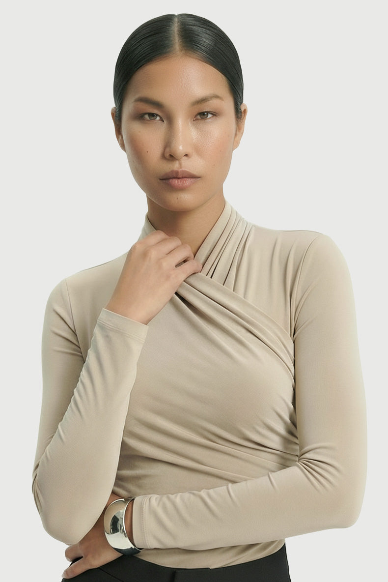 SORA bodysuit with an asymmetrical wrap neckline and long sleeves.