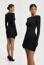 The Lanova Muze dress is the essence of feminine strength and inspiration. Designed with form and proportion in mind, it subtly shapes the silhouette thanks to decorative stitching at the waist, which visually accentuates it, giving the dress an architectural character.