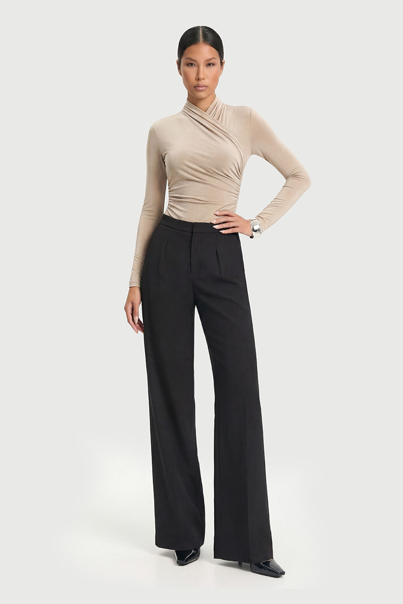 SORA bodysuit with an asymmetrical wrap neckline and long sleeves.